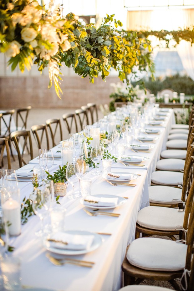white and gold wedding table decor with floating greenery decor