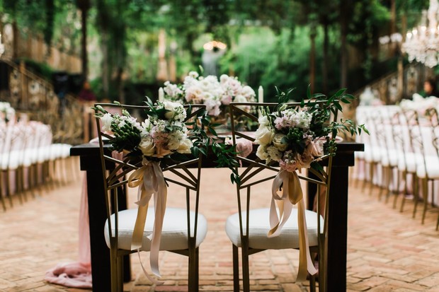 floral decorated sweetheart chairs