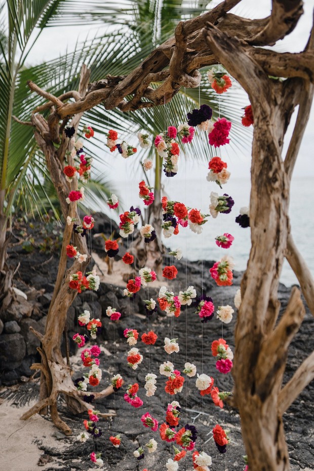 driftwood and floating floral wedding backdrop