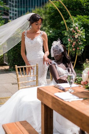 brides at an outdoor reception
