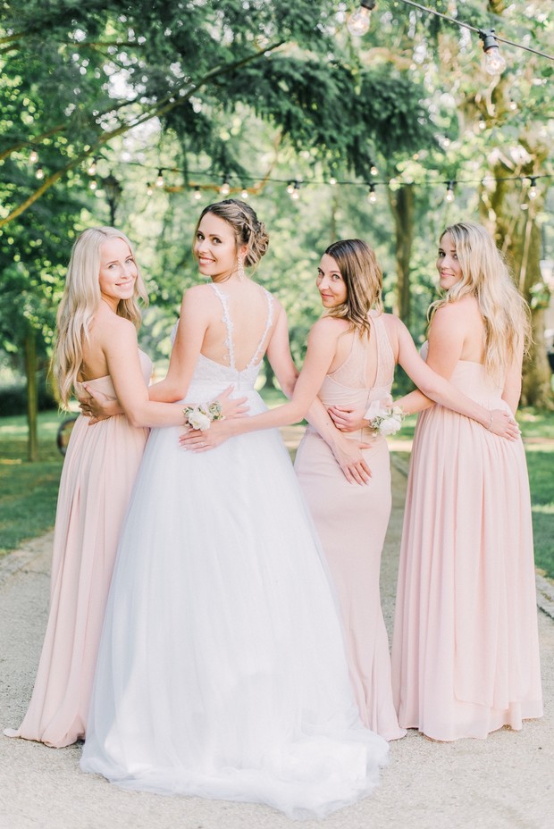 bridal party in beautiful blush dresses