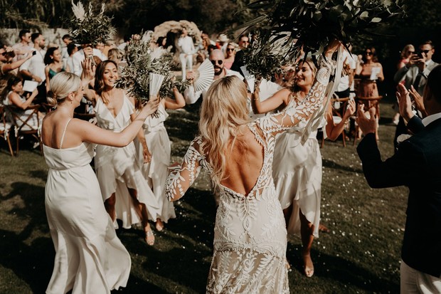 bride dancing with bridesmaids
