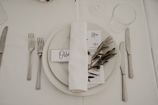wedding place setting with greenery