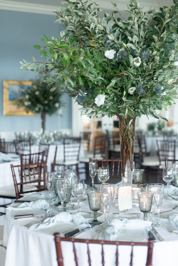 tall greenery centerpiece for a wedding