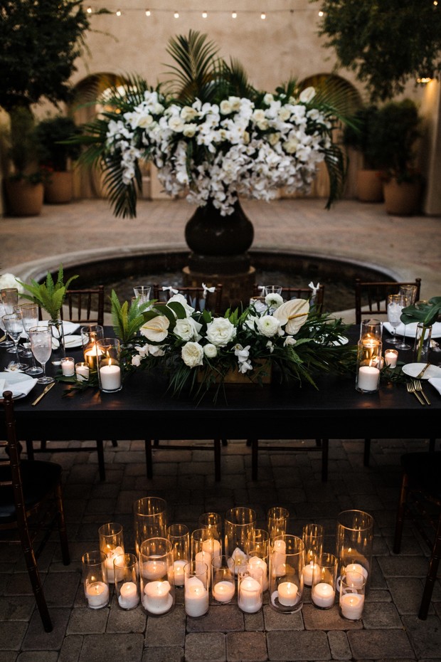 white and green tropical floral decor for your reception