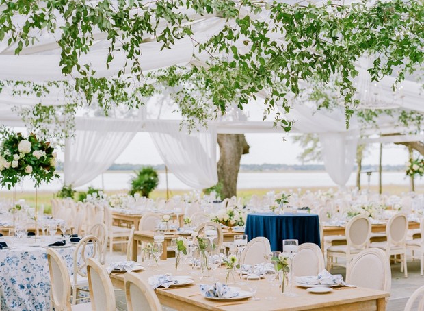 Elegant outdoor wedding reception with floral decor