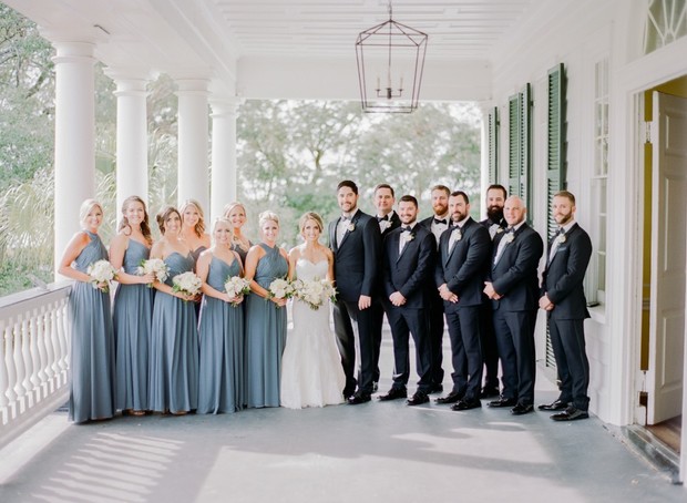 Bride bridesmaids and groomsmen at wedding reception