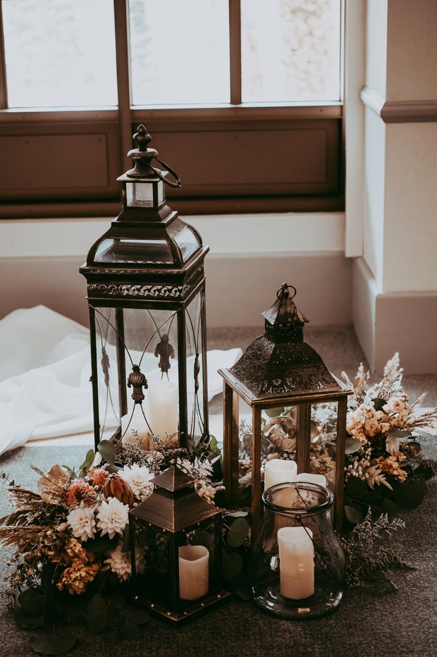 vintage lanterns flowers and candles for your wedding ceremony decor