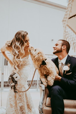 cute candid wedding couple and wedding dog