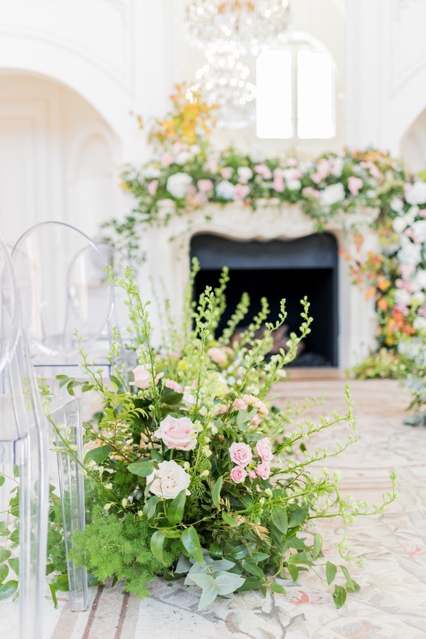 elegant overgrown garden inspired wedding aisle decor
