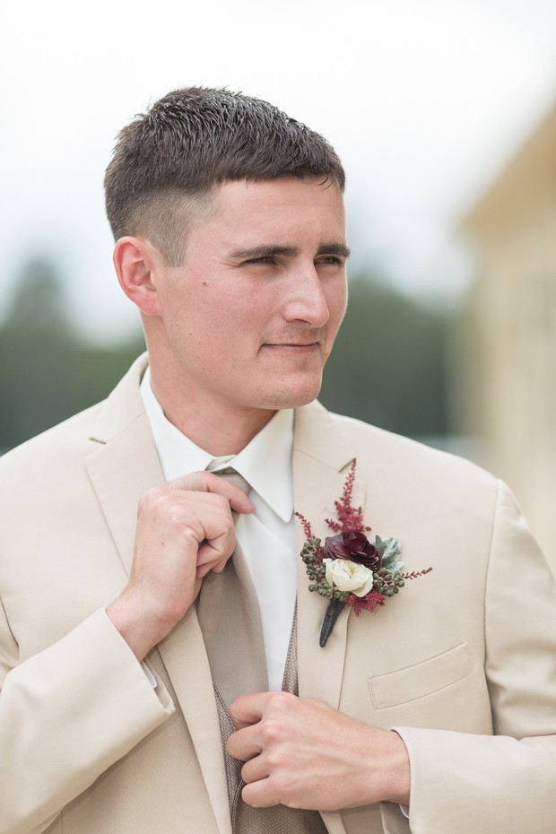 groom in tan suit jacket