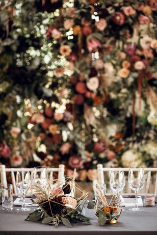 sweetheart wedding table with flower backdrop