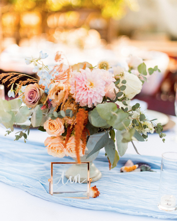 wedding table number and floral centerpiece