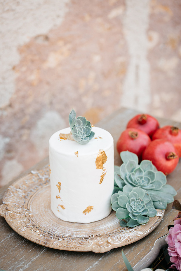 mini wedding cake with gold flakes