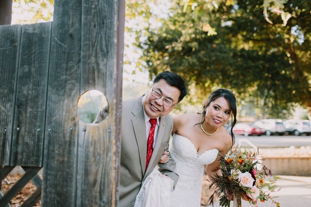 cute bride and father of the bride wedding ceremony entrance photo
