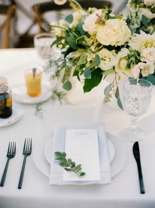 soft grey and white garden wedding reception place setting