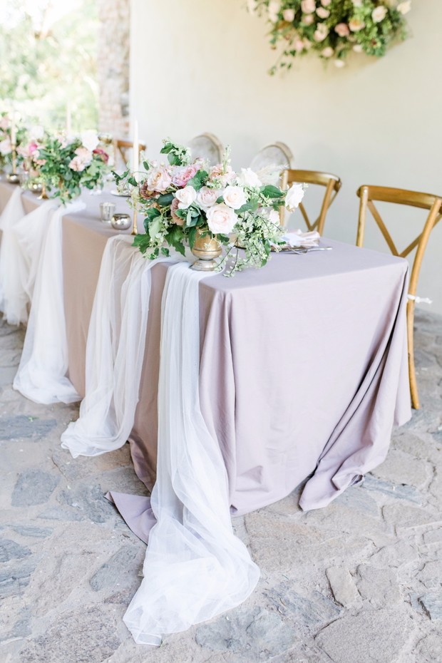 soft blush and romantic wedding party table