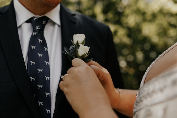 dog tie and white boutonniere