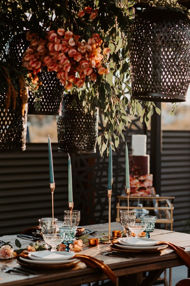 hanging lanterns over reception table