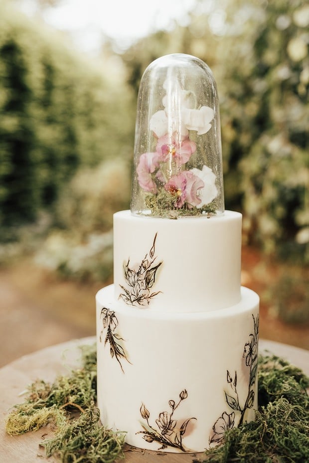 floral terrarium topped wedding cake