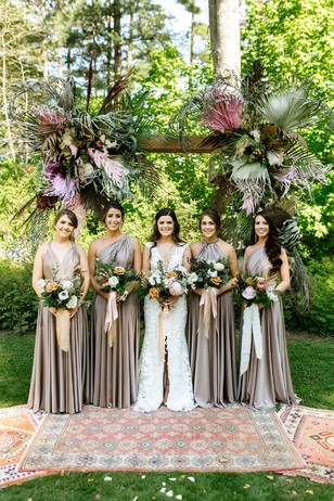 bridesmaids in deep champagne dresses