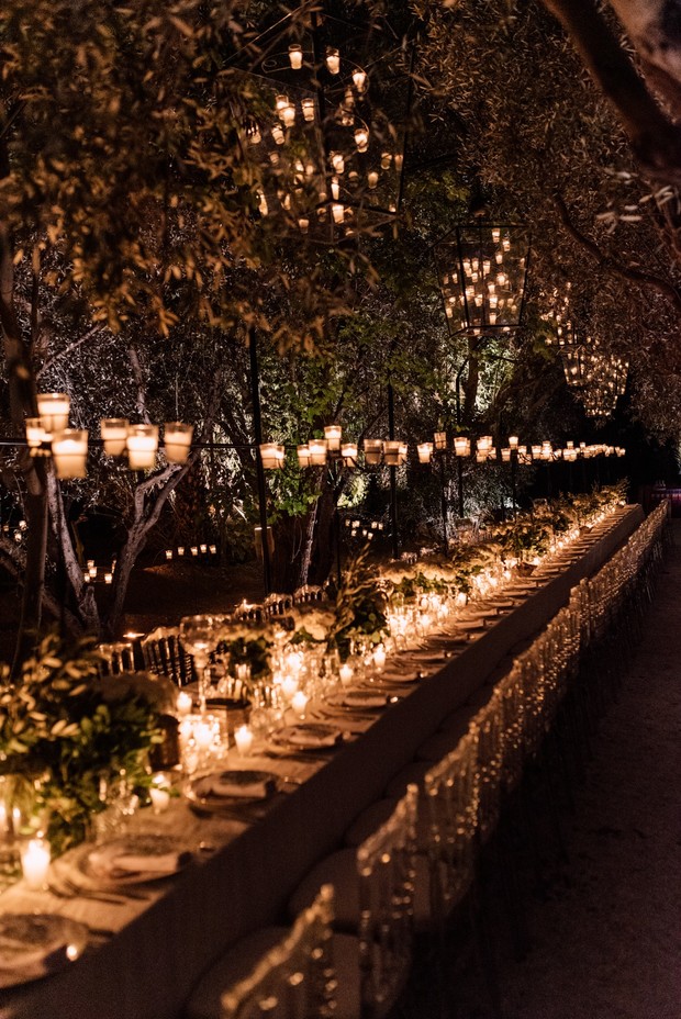 outdoor wedding ceremony with family feast style seating