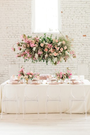 white and pink wedding reception floral decor