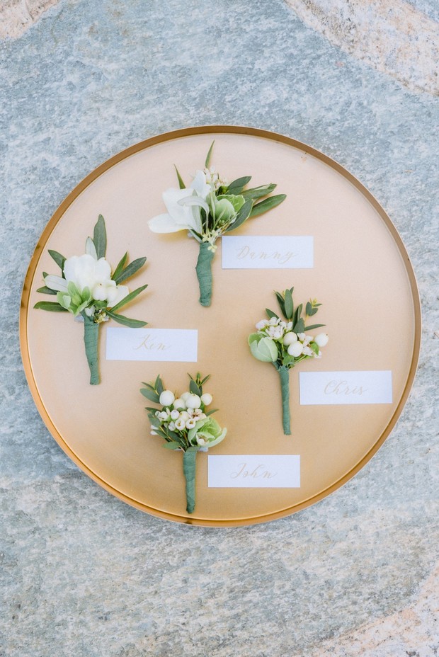 simple and white boutonnieres