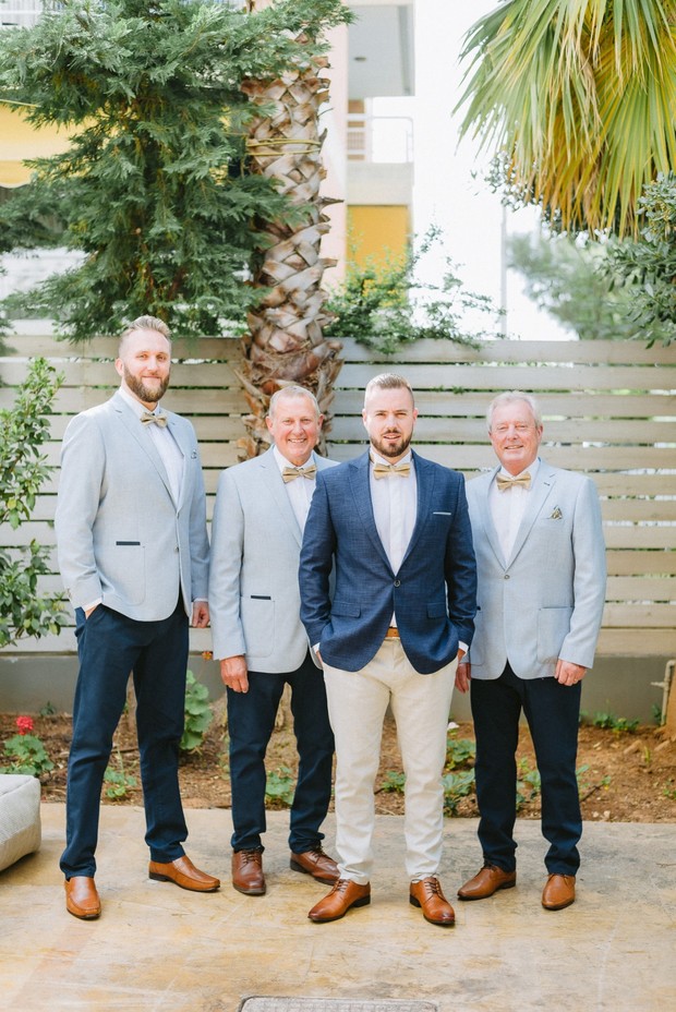 grey and blue groom and his groomsmen