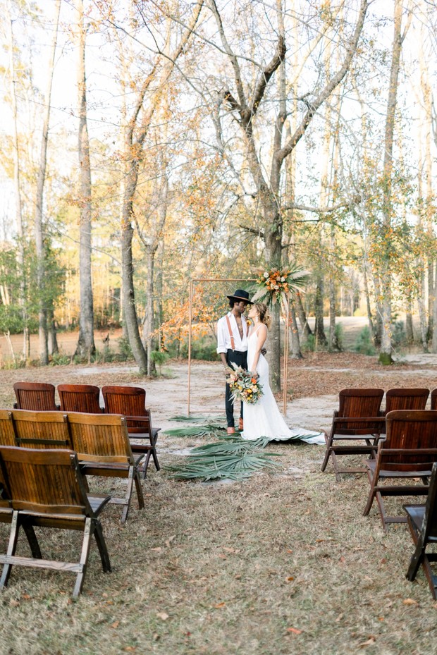outdoor wedding ceremony with a rustic boho modern vibe