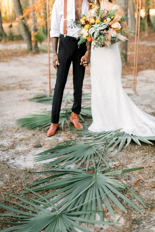 palm leaf wedding aisle decor idea