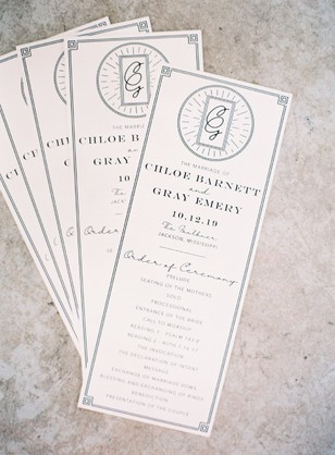 Elegant wedding programs, featuring names and ceremony details