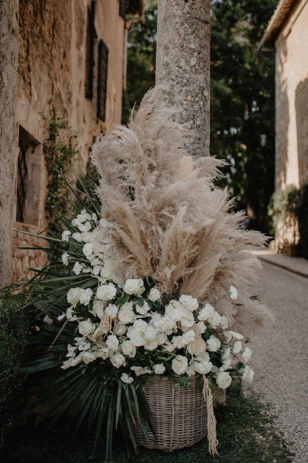 pampas grass and white floral wedding decor