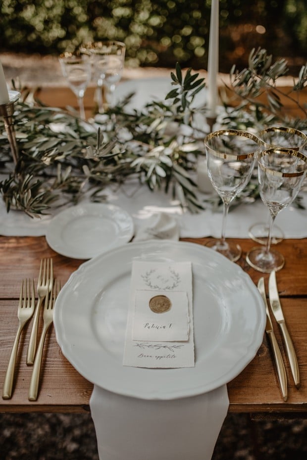 gold and white wedding place setting with tuscan flair