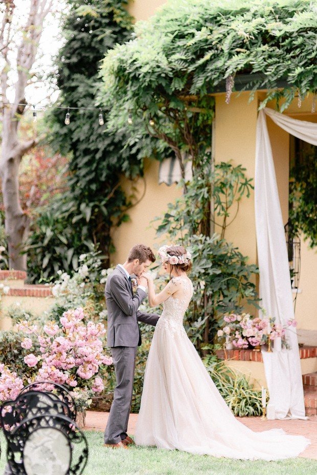 garden wedding ceremony with whimsical butterfly theme