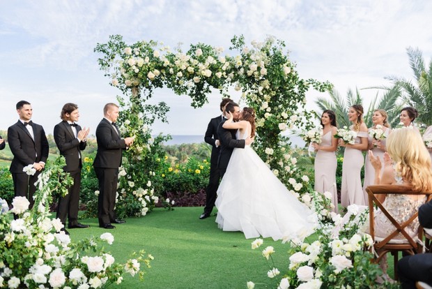 Green and white wedding ceremony