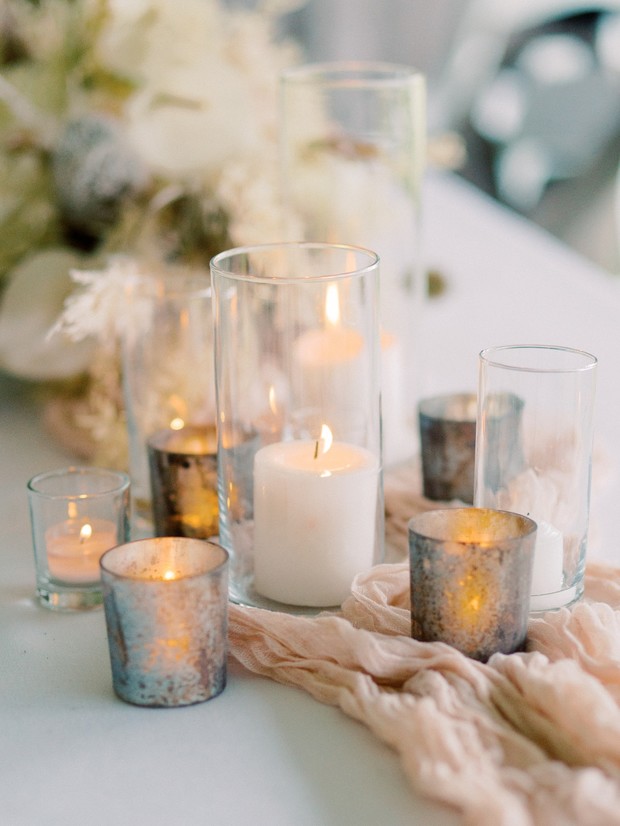 wedding reception lit by candles