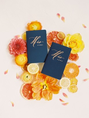 His Vows book with dried citrus and floral decorations