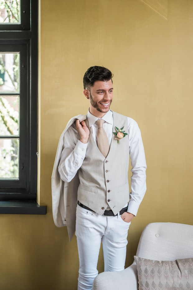groom in white jeans