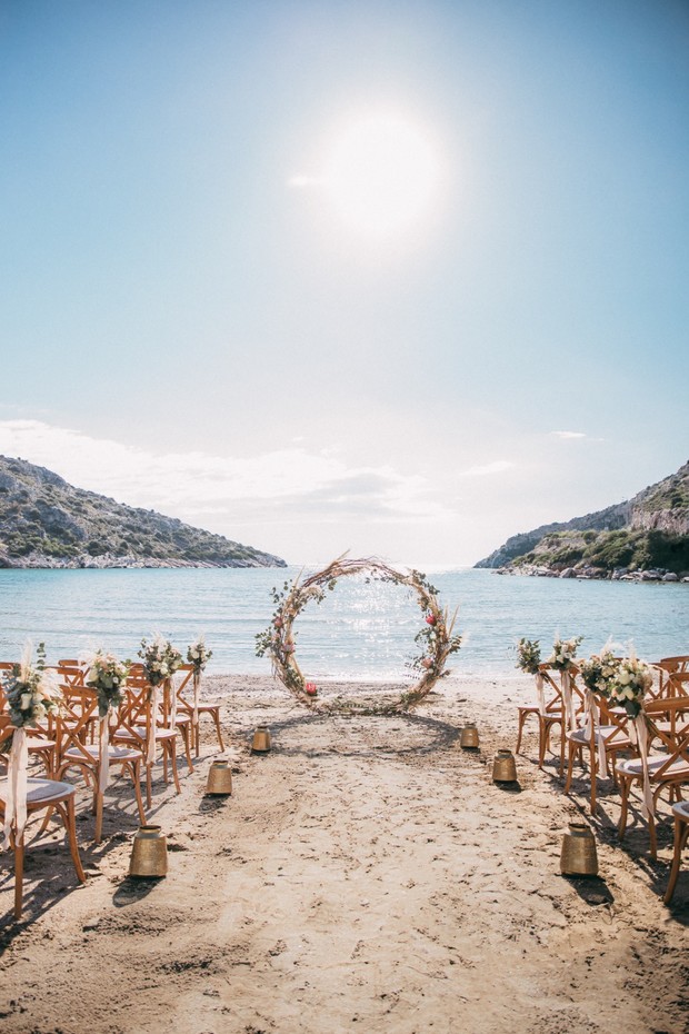 beach wedding with circle arbor