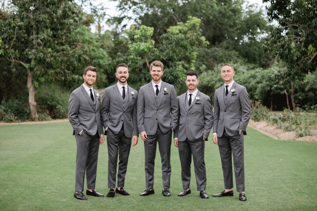 groomsmen in grey suits