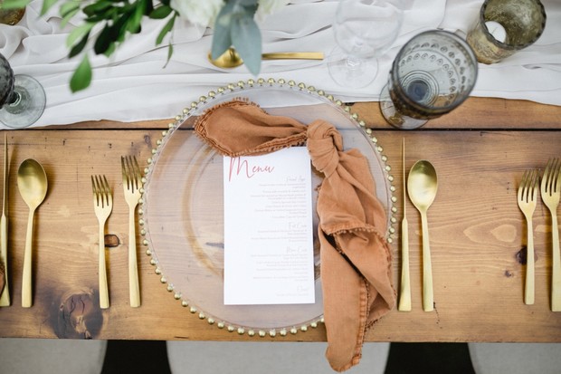 wedding place setting with gold accents