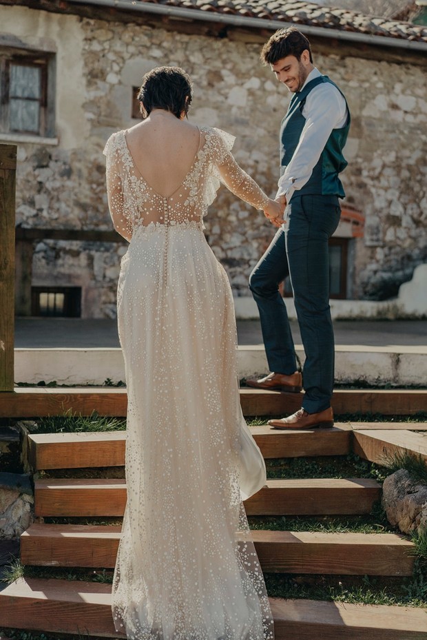 wedding dress with sleeves and low back