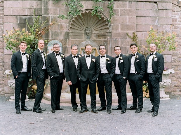 groom and his men in tuxedos