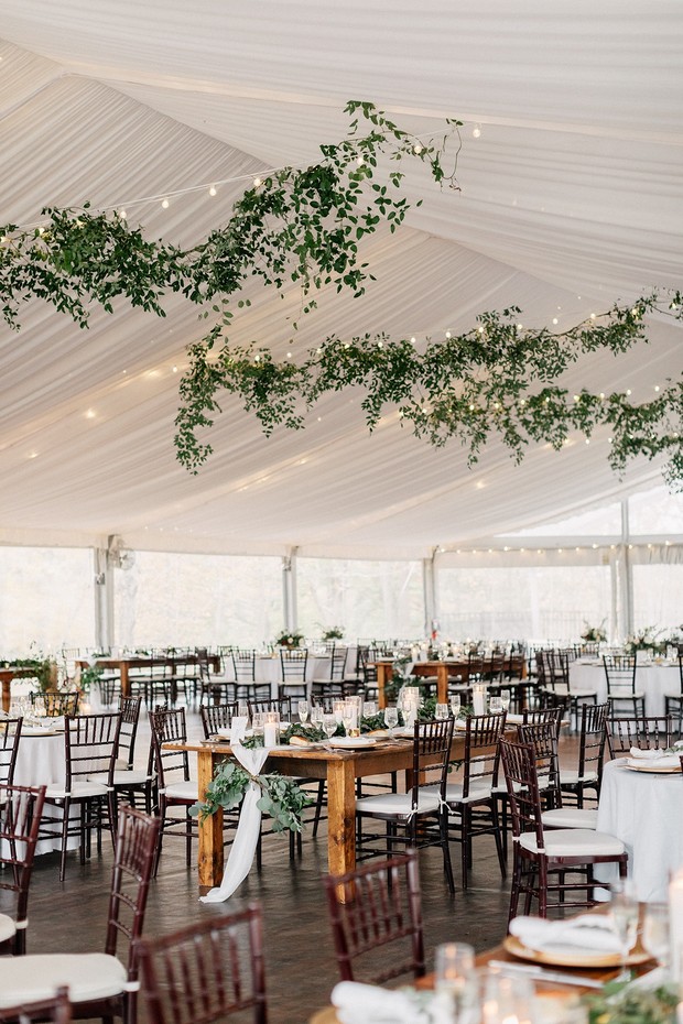 hanging greenery and lighting for a wedding reception