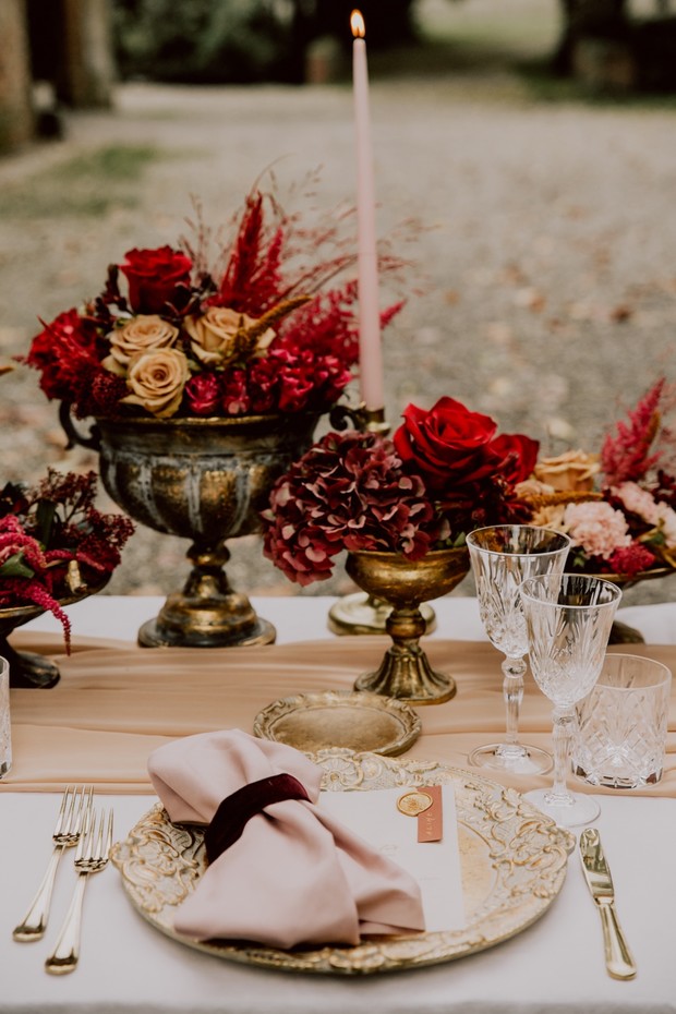 gold and red wedding reception table