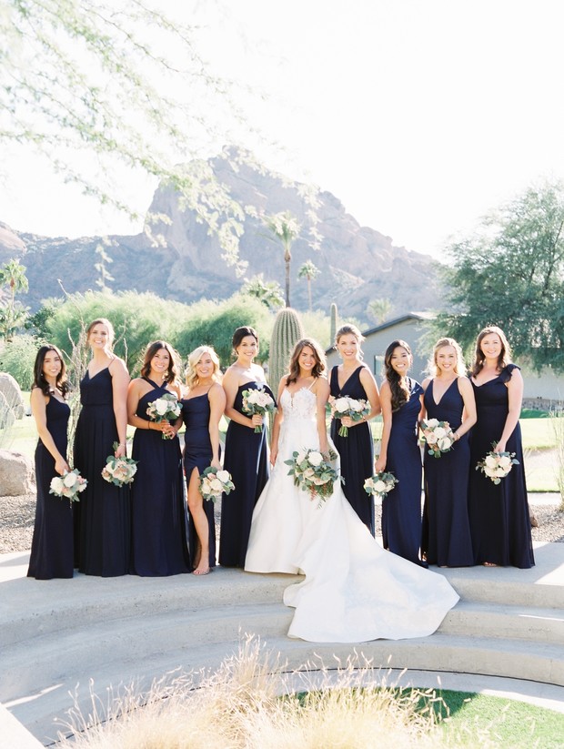 bridesmaids in navy and black dresses