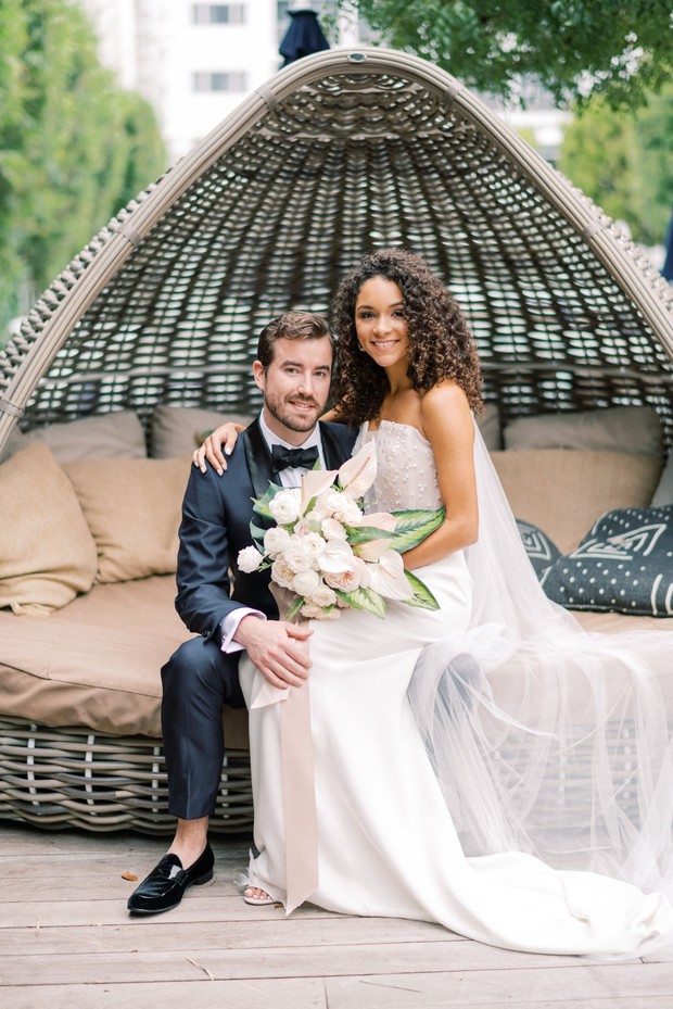Smiling bride and groom on their outdoor wedding day