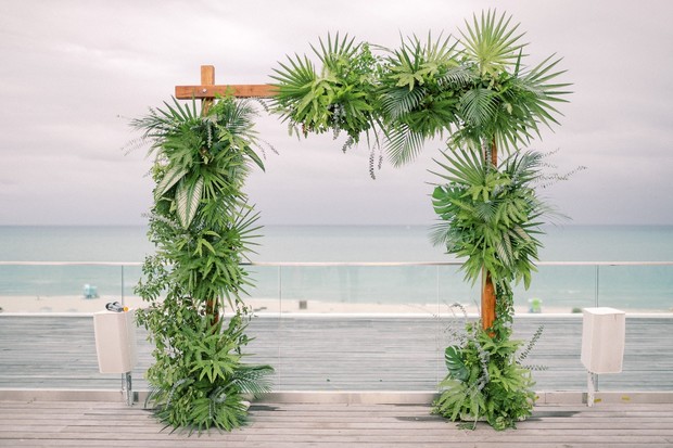 tropical greenery ceremony backdrop