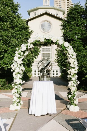 white flower wedding arch